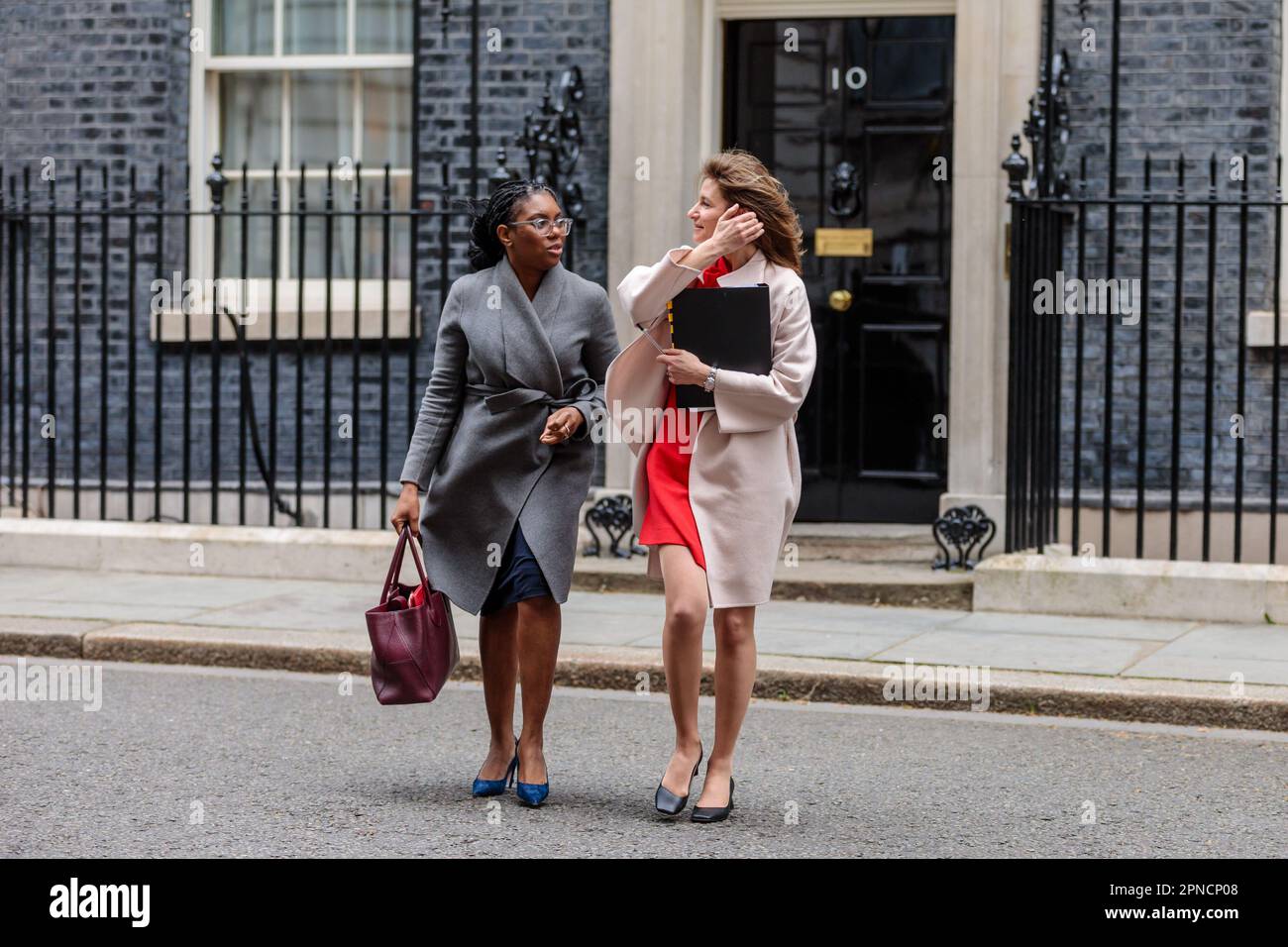 Downing Street, London, UK. 18th April 2023.  Kemi Badenoch MP, Secretary of State for Business and Trade and President of the Board of Trade and Minister for Women and Equalities, and Lucy Frazer MP, Culture Secretary, attends the weekly Cabinet Meeting at 10 Downing Street. Photo by Amanda Rose/Alamy Live News Stock Photo