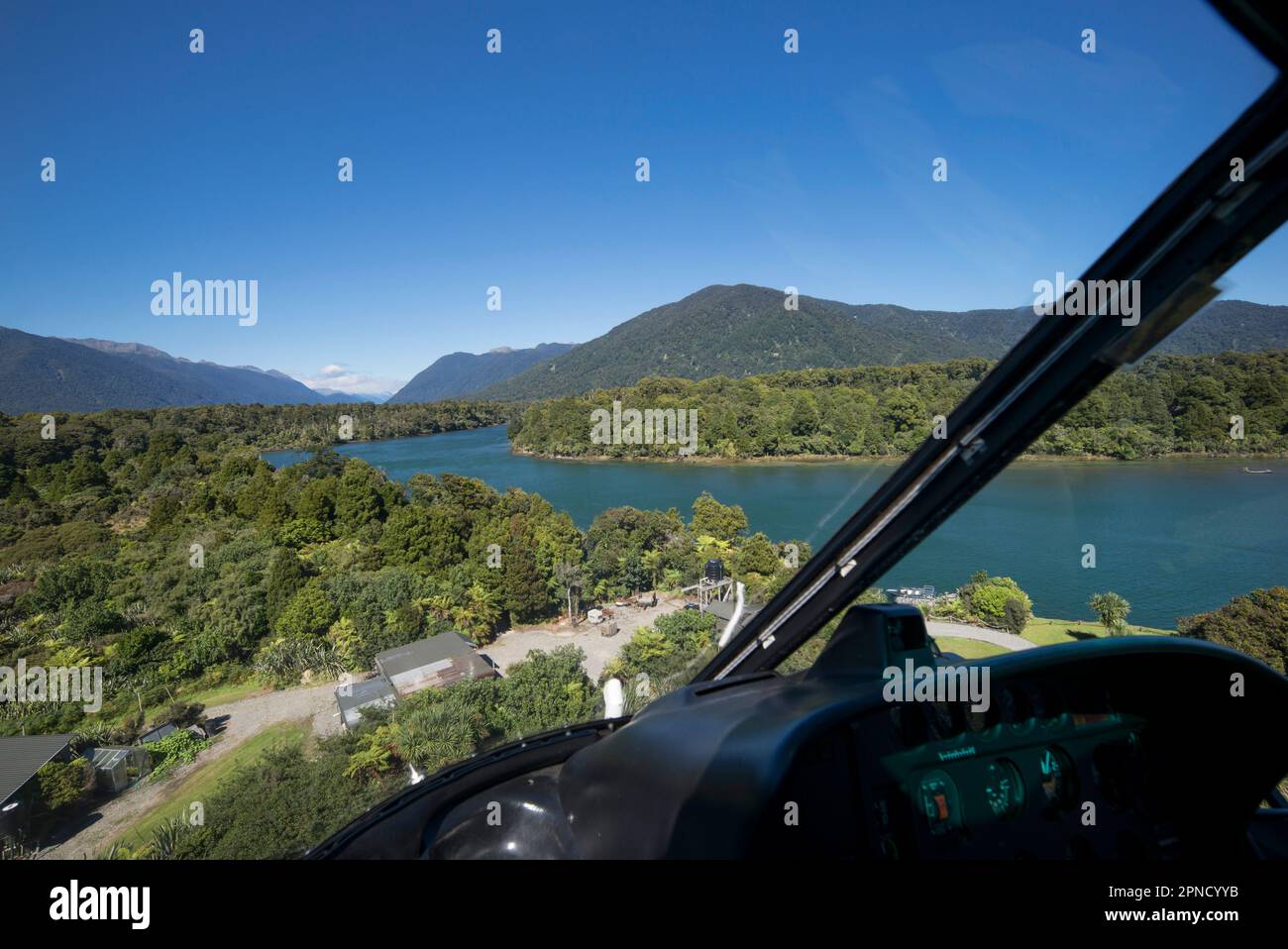 Approaching Milford airport by helicopter, South Island, New Zealand. Stock Photo