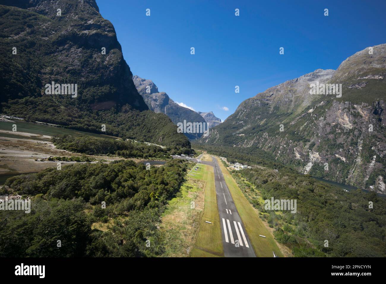 Approaching Milford airport by helicopter, South Island, New Zealand. Stock Photo
