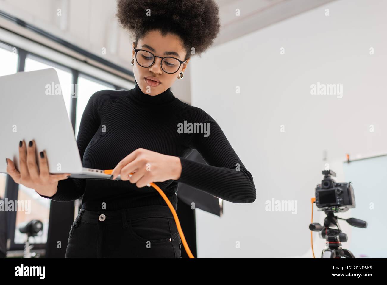 Content black woman laptop hi-res stock photography and images - Alamy
