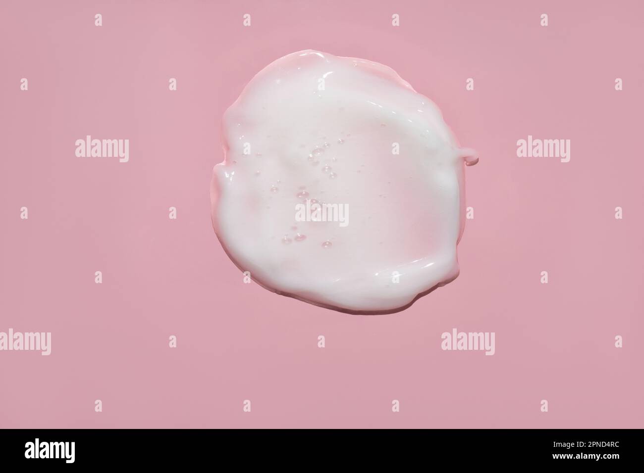 white opaque cream with bubbles lotion moisturizer smudge swatch