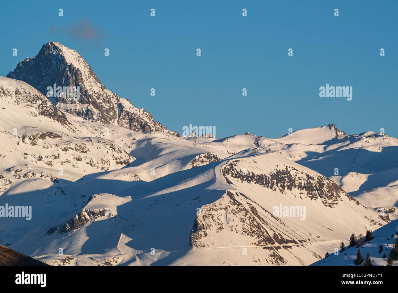 Blue morning sky over the French Alps mountains, Alpe d'Huez, France Stock Photo