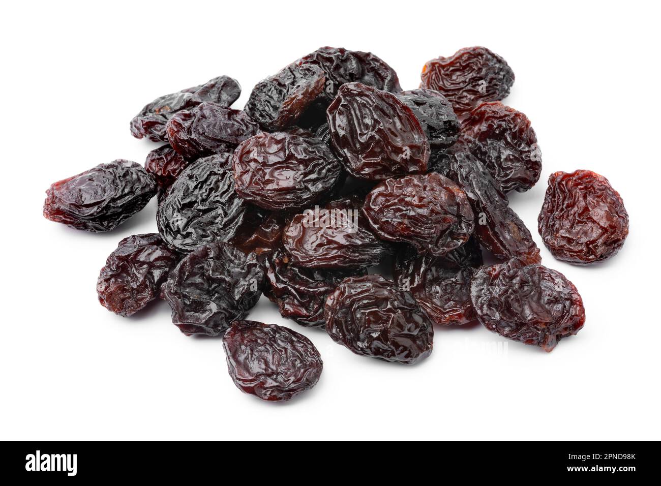 Heap of black flame raisins from Chili close isolated on white background Stock Photo