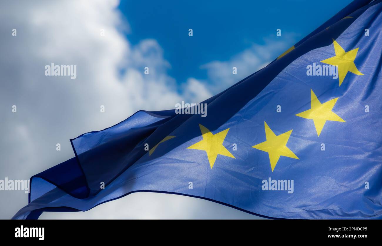 Official flag of the European Union in front of a blue sky Stock Photo ...