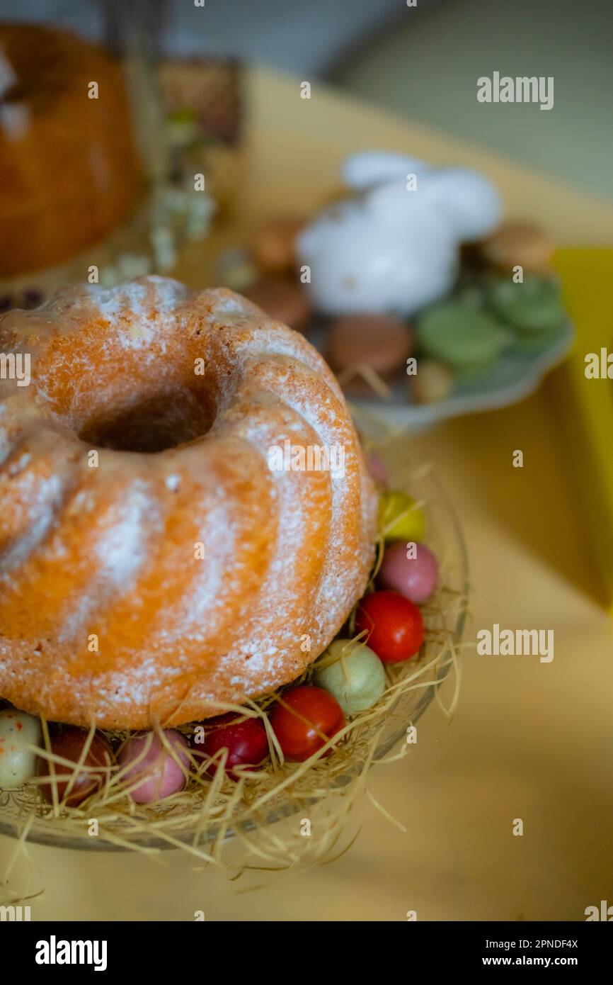 Fresh Cakes Pastries at Easter Holidays Table Stock Photo