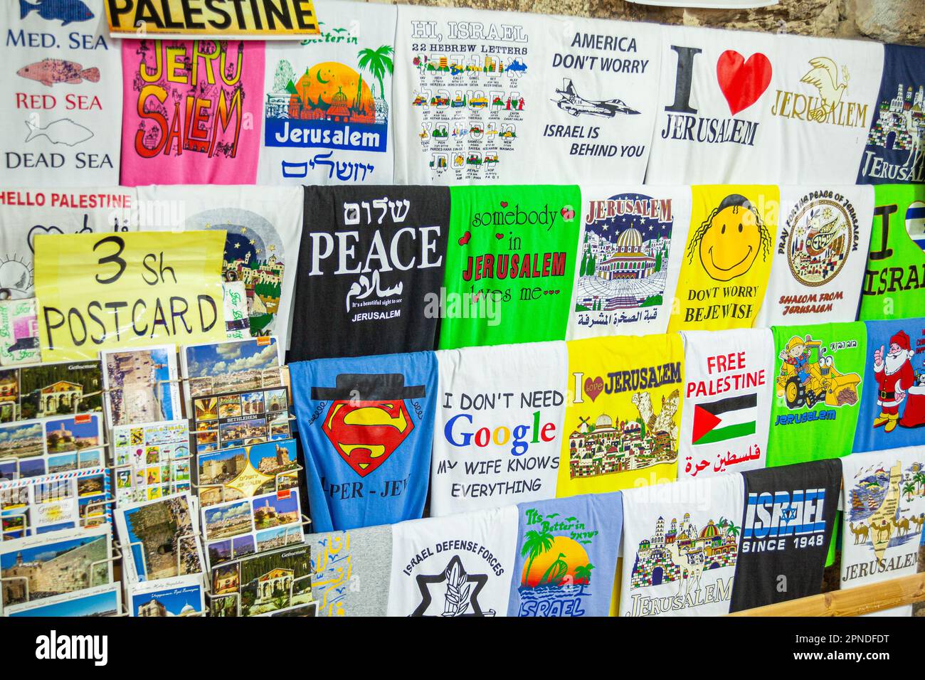 Novelty T Shirts for sale in a shop at the Damascus Gate in East Jerusalem Palestine Stock Photo