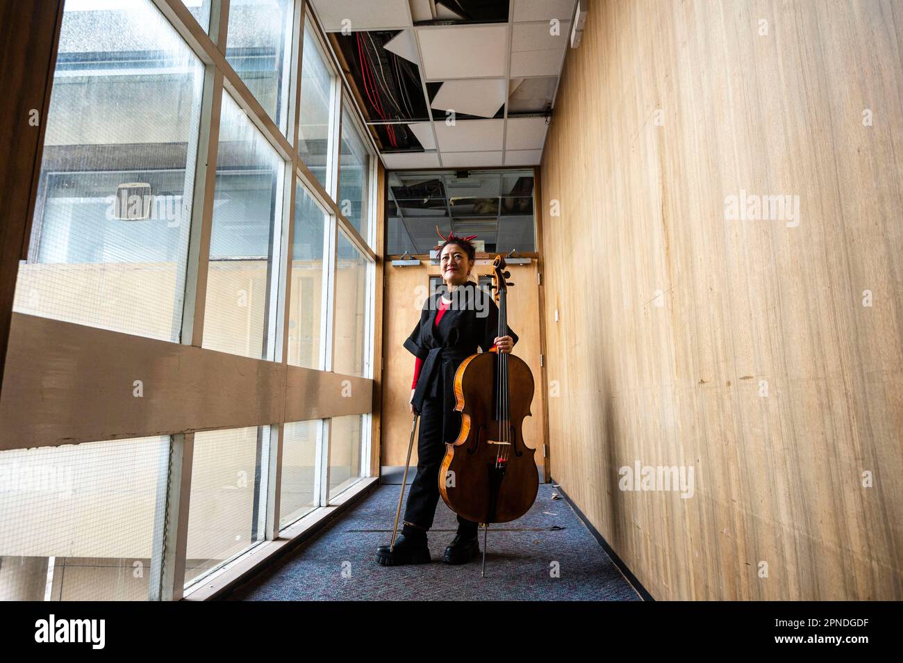 Scottish Chamber Orchestra’s principal cellist Su-a Lee poses in the derelict building which is to become the site of the future Dunard Centre, the UK’s first Nagata concert hall.   Credit: Euan Cherry Stock Photo