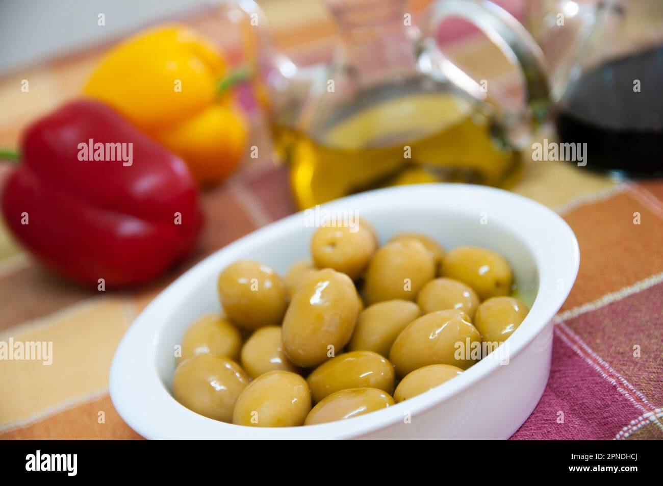 Green olives with olive oil and balsamic vinegar Stock Photo Alamy