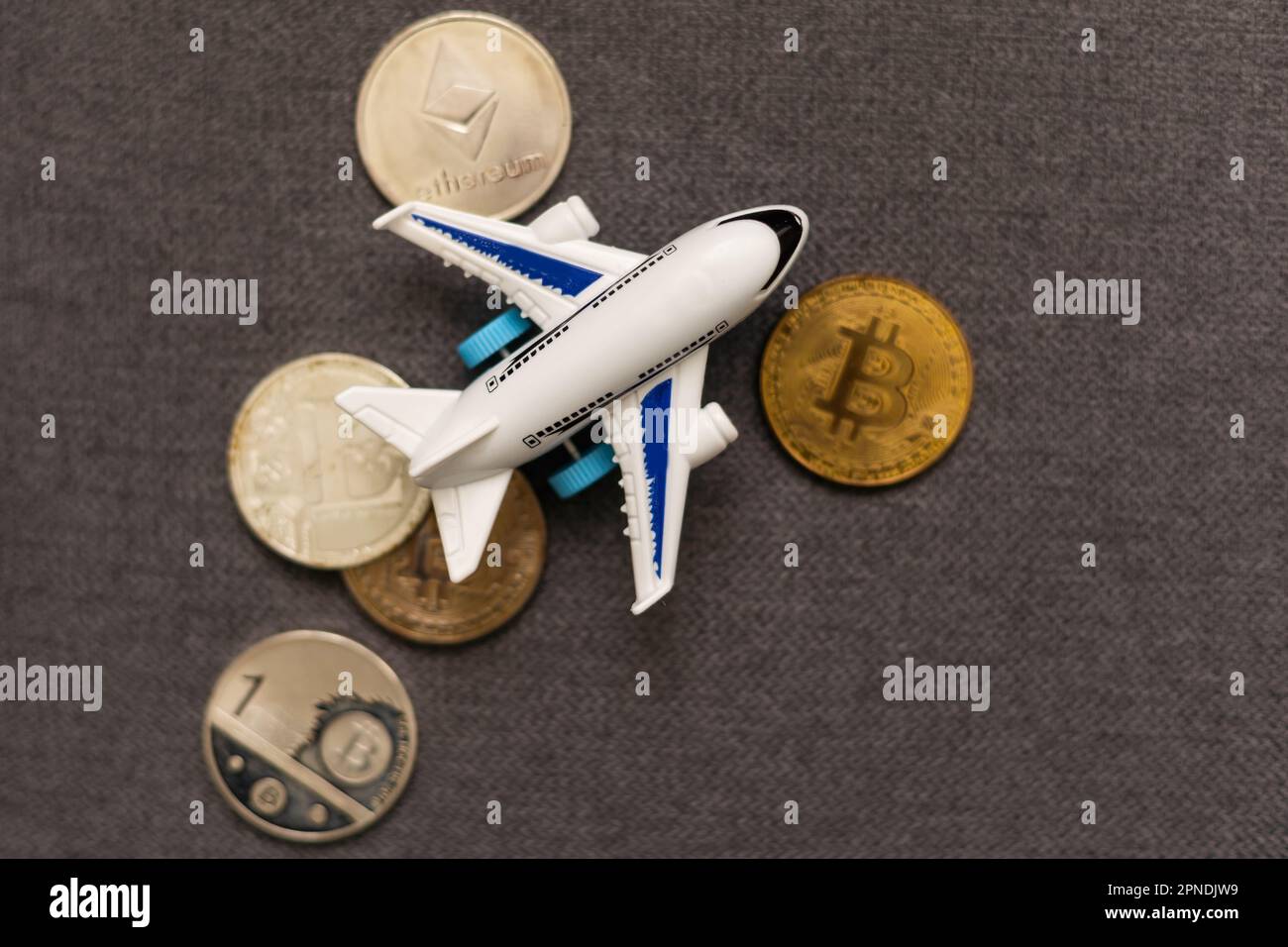 Passport, bitcoin, the airplane background. The concept of travel Stock  Photo - Alamy