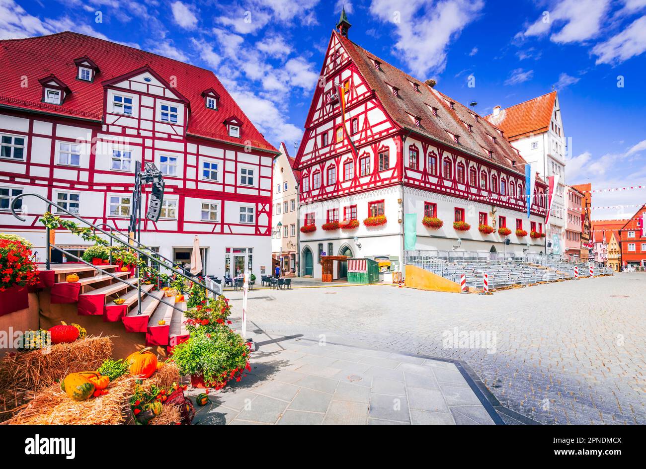 The Marktplatz in Nordlingen, Germany is a charming square surrounded by historic buildings and bustling with markets and festivals. Stock Photo