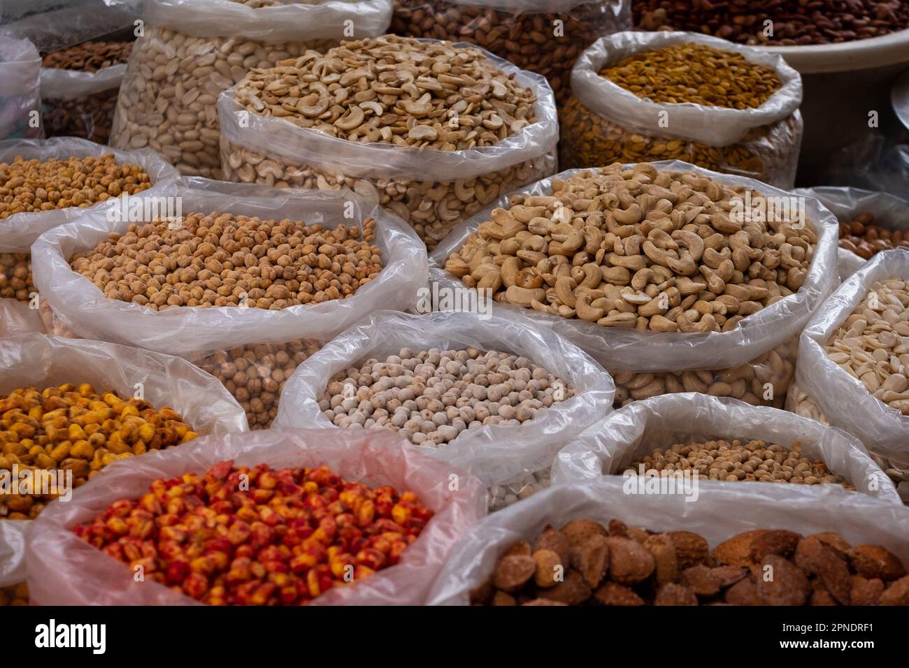 Bags of nuts for sale, snacks on food market Stock Photo Alamy