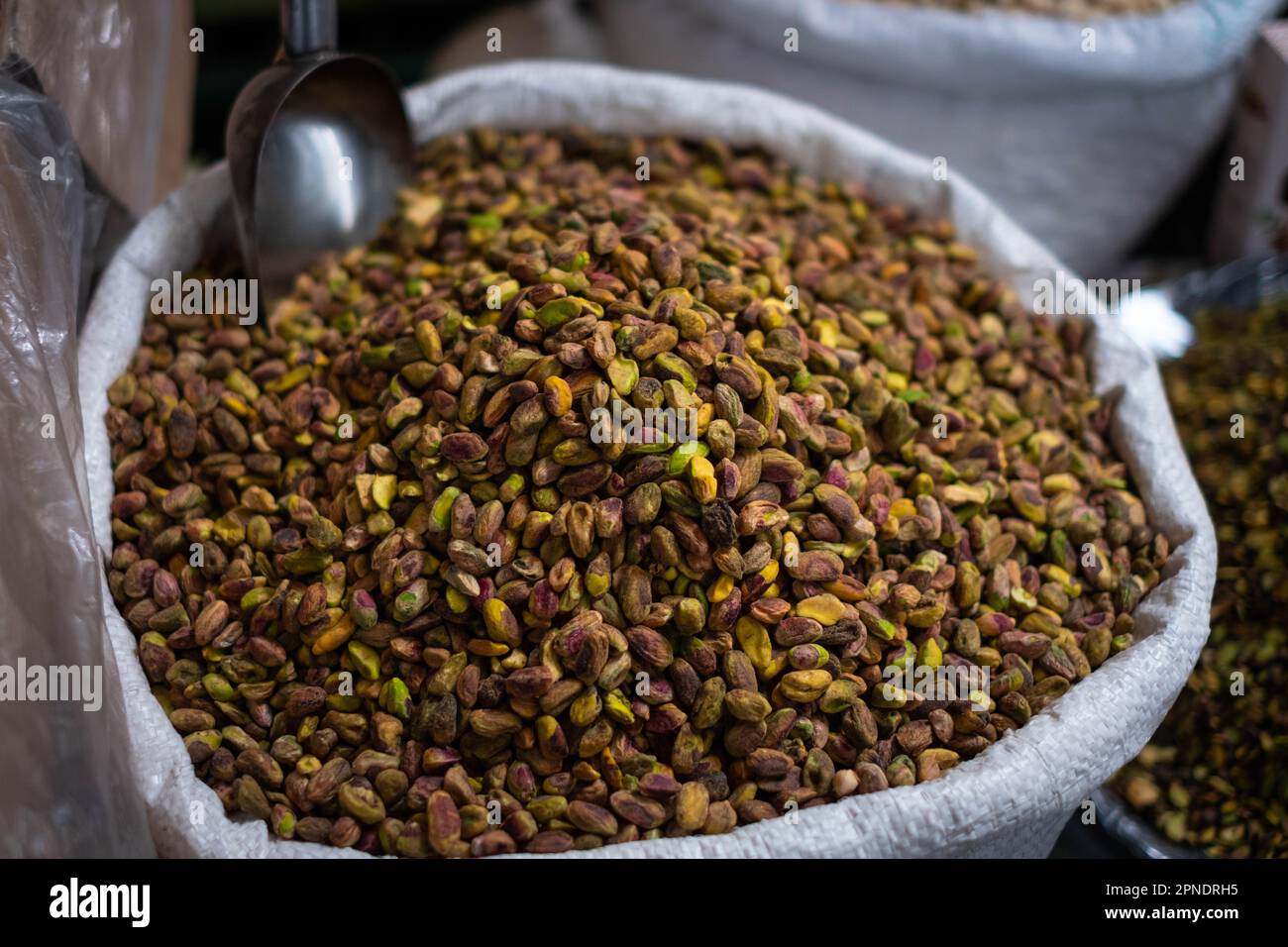 Bag of pistachios for sale on food market Stock Photo Alamy