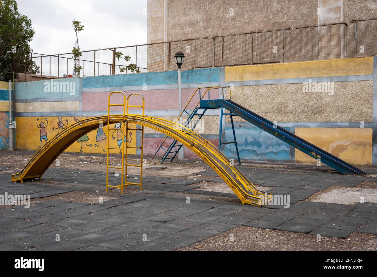 run down slide on old playground, Damascus, Syria , Stock Photo