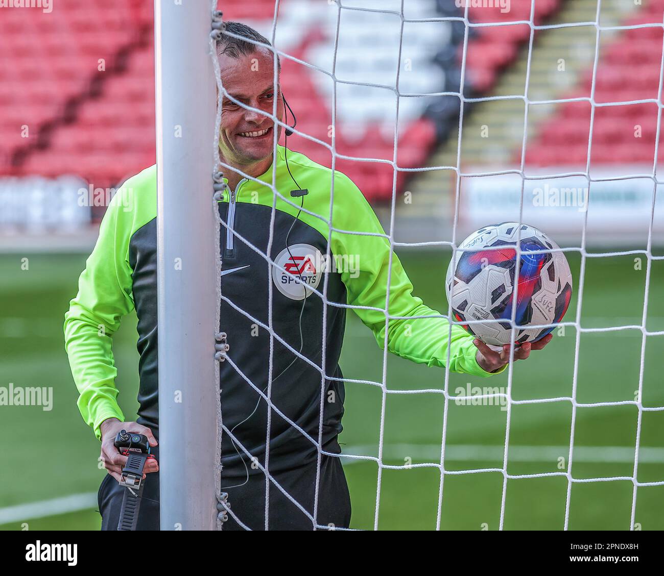 Referee Geoff Eltringham checks the goal line technology ahead of the
