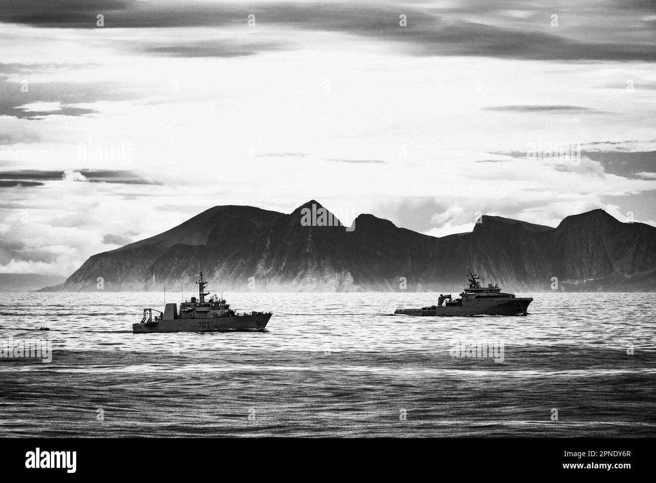 Navy and Coast Guard ships seen from HMCS Margaret Brooke during a transit of Saglek Fjord, Labrador, Canada, during Operation Nanook 2022. Stock Photo