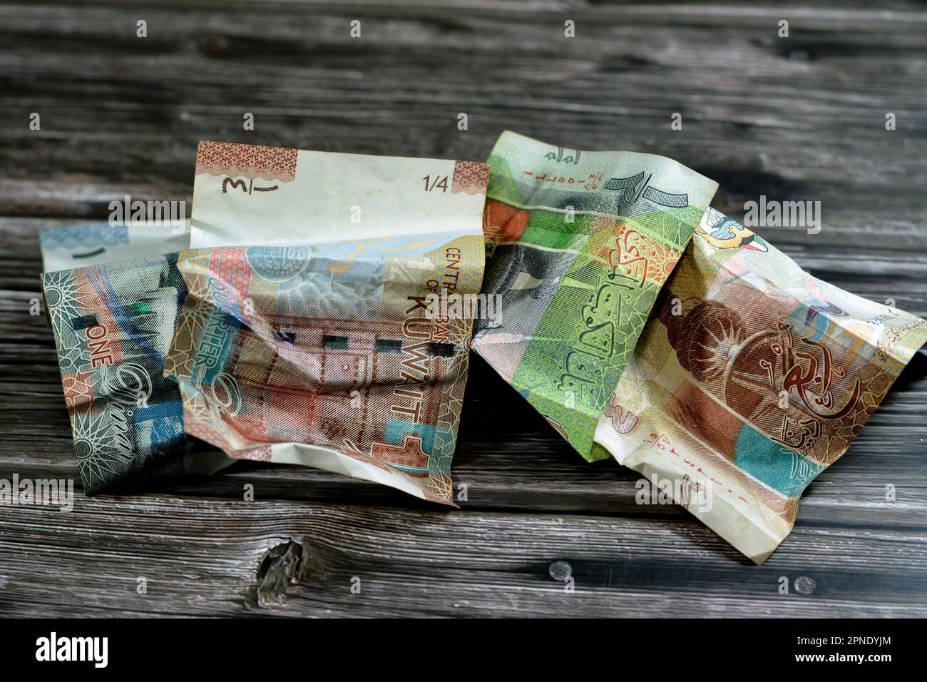 crumpled Kuwaiti money of quarter, half and one KWD Kuwait dinar bills banknote isolated, wrinkled dinars cash bill banknotes, economy inflation conce Stock Photo