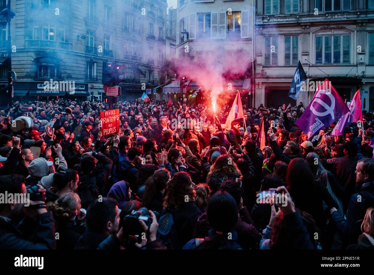 Jan Schmidt-Whitley/Le Pictorium - 17/4/2023  -  France / Paris / Paris  -  Plusieurs milliers de personnes se sont reunies devant la mairie du 10e arrondissement de Paris pour protester contre la politique de Emmanuel Macron et contre la reforme des retraites. Plusieurs centaines de personnes ont ensuite parcouru Paris pendant plusieurs heures en formant de multiples corteges sauvages et jouant au chat et a la souris avec les forces de l'ordre depassees par les evenements et la mobilite des groupes composes majoritairement de jeunes etudiants.   / 17/4/2023  -  France / Paris / Paris  -  Seve Stock Photo