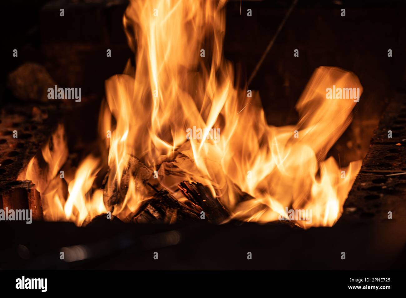 Long exposure image of a campfire burning at night Stock Photo - Alamy