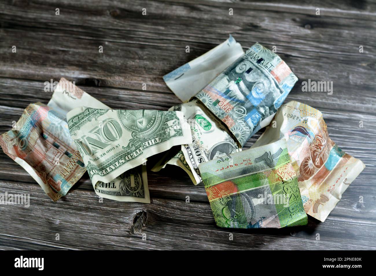 Wrinkled and crumpled Kuwaiti half, quarter and one KWD dinar bills
