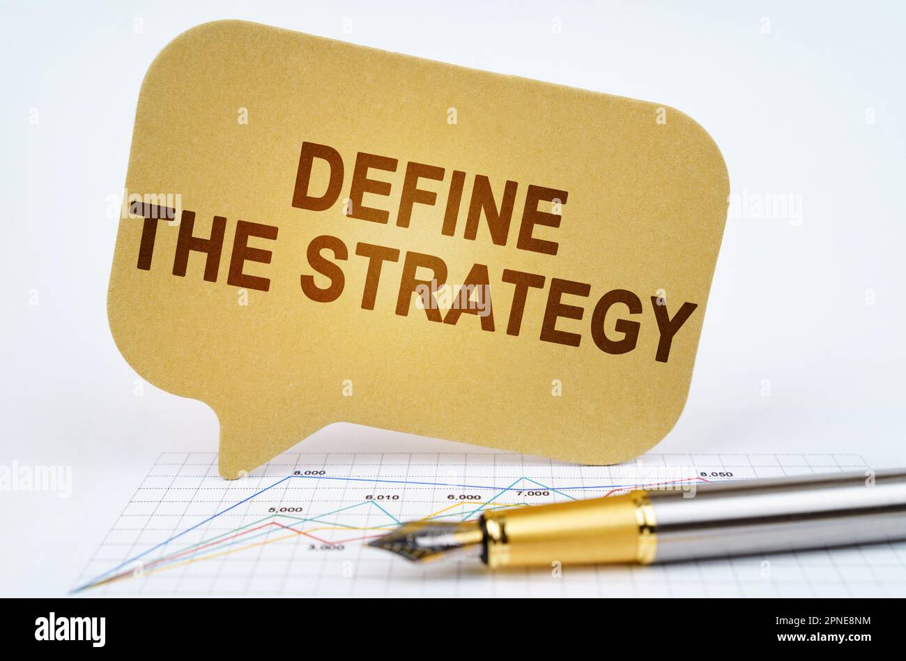 Business concept. On the business diagram is a pen and a sign with the