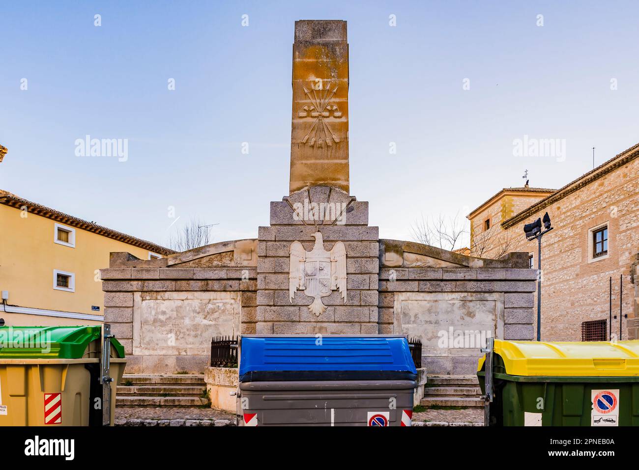 Garbage containers next to the monument for the fallen by the civil war of the Francoist side. Ocaña, Toledo, Castilla La Mancha, Spain, Europe Stock Photo