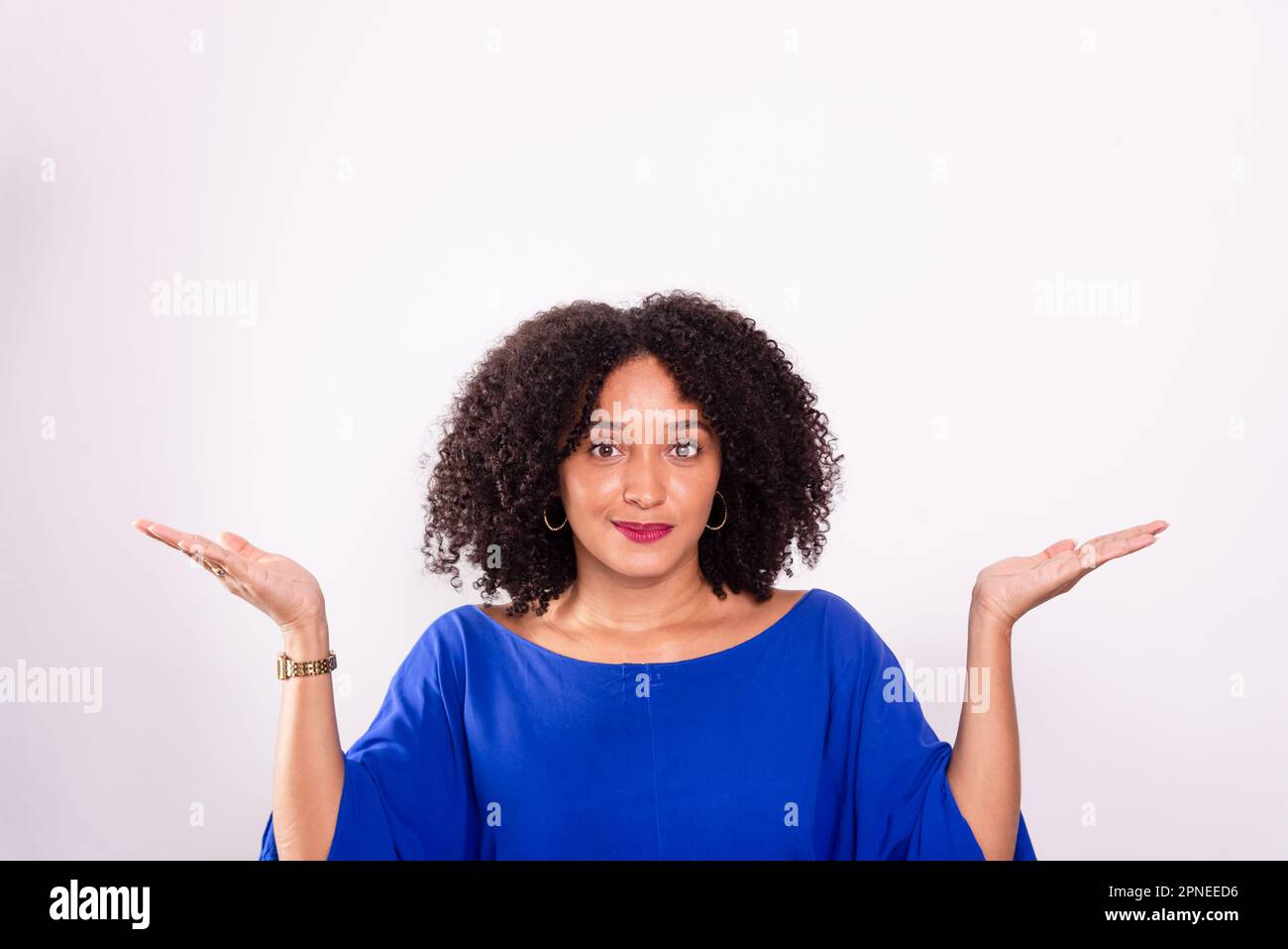 Young businesswoman in her home office making hand gestures. Isolated