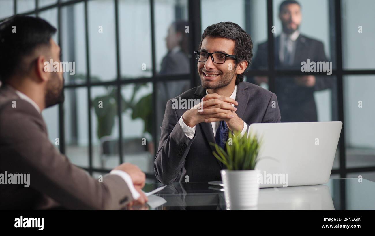 Caucasian business partners talking, HR manager conducting an interview ...