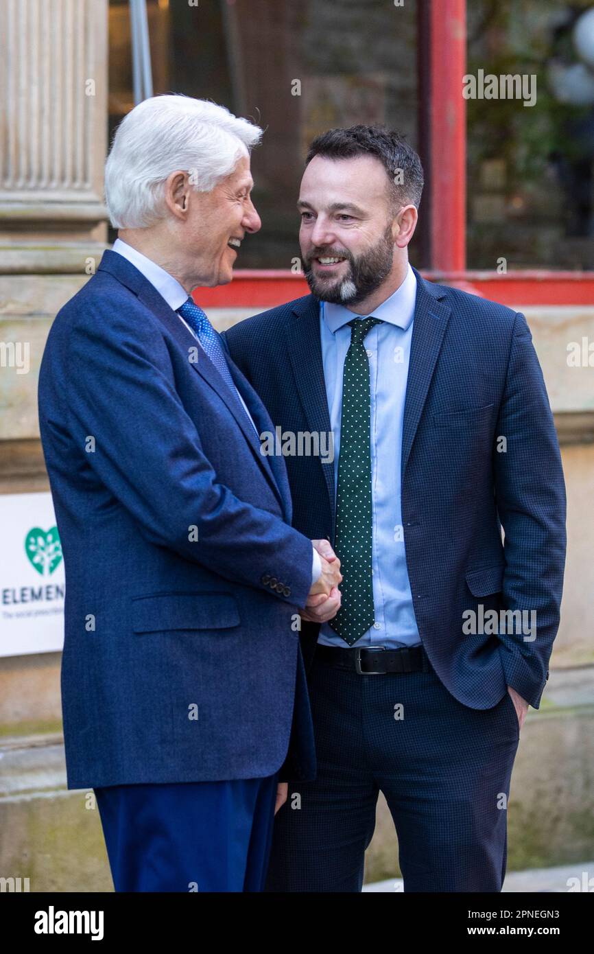 Former US President Bill Clinton with SDLP leader Colum Eastwood MP, as