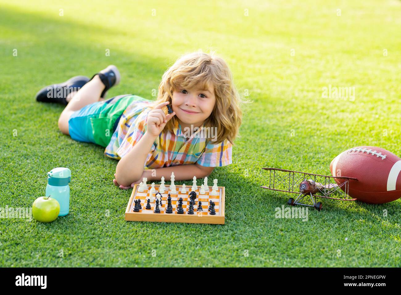Spring games and outdoor activities for kids. Chess school outdoor
