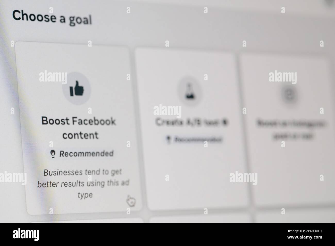 New york, USA - April 14, 2023: Boost facebook content in business on computer screen close up view Stock Photo