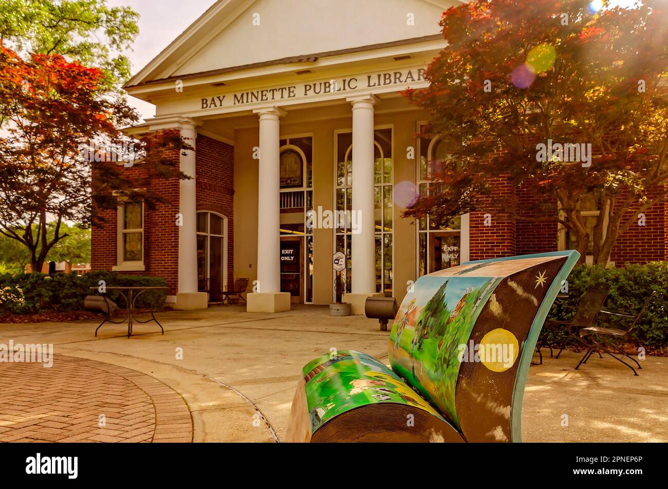 Bay Minette Public Library is pictured with an artistic book bench ...