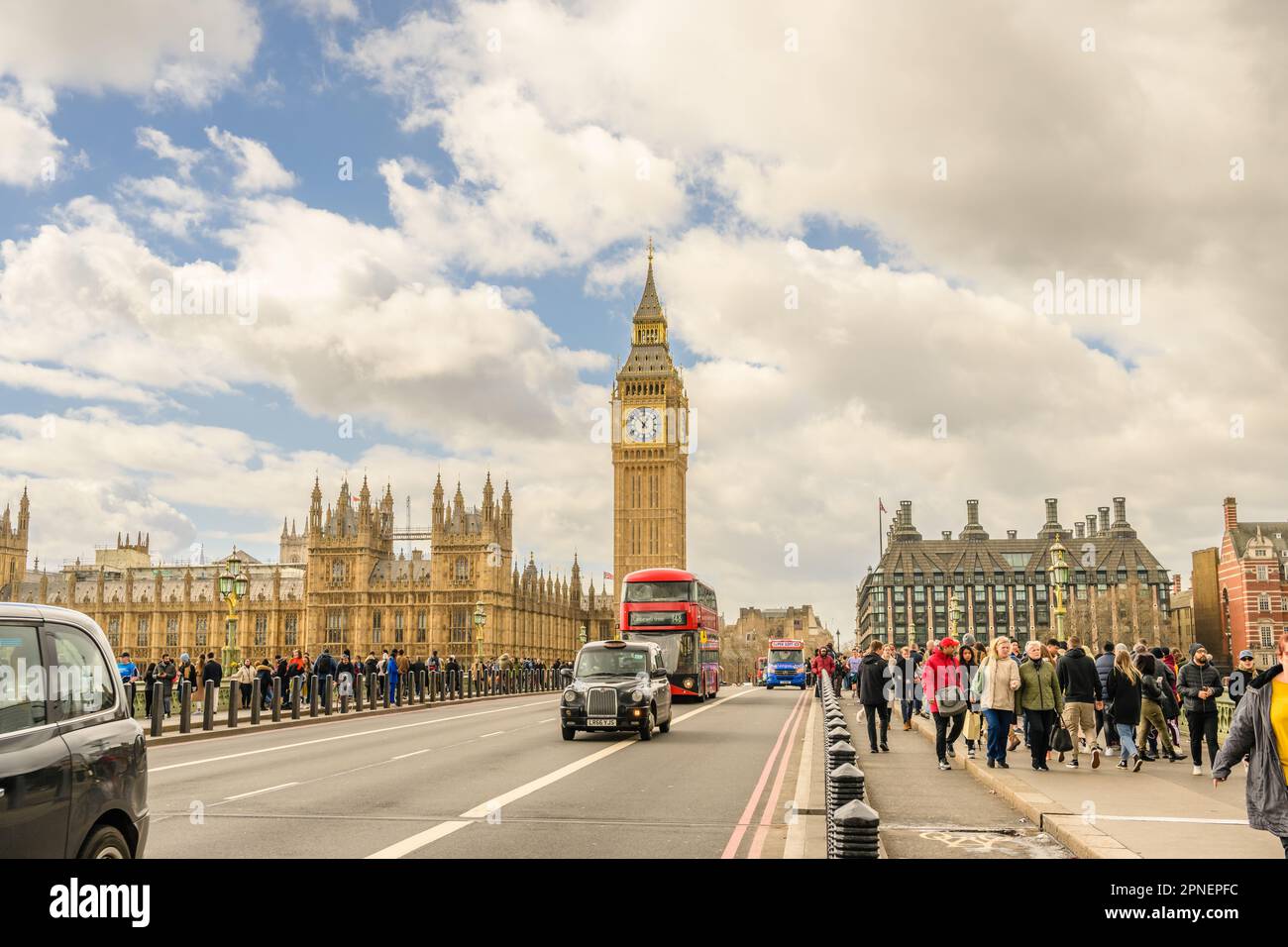 A bustling city street over a bridge near the Big Ben in London, United ...