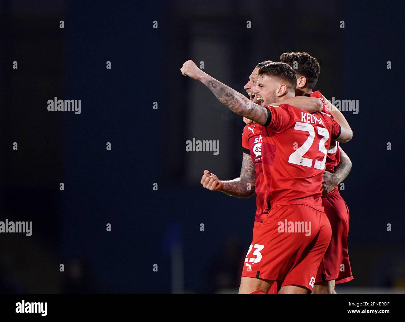 Leyton Orient's Charlie Kelman celebrates promotion as the lights come