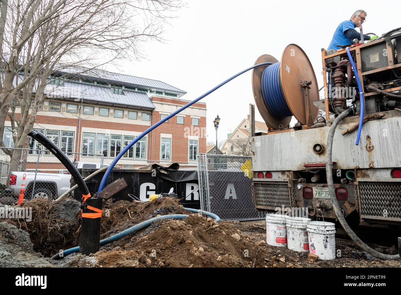 March 17, 2023. Beverly, MA. Grouting of test well.  Installation of a test well to determine existing geothermal groundwater conditions for the Bever Stock Photo