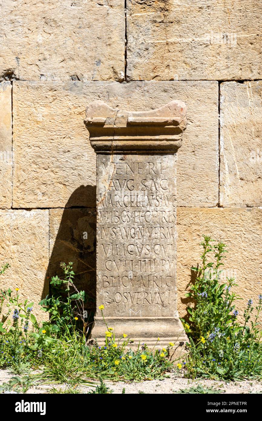 Stone with an inscription in Latin script in the ancient city of Cuicul-Djemila. UNESCO world heritage site. Stock Photo