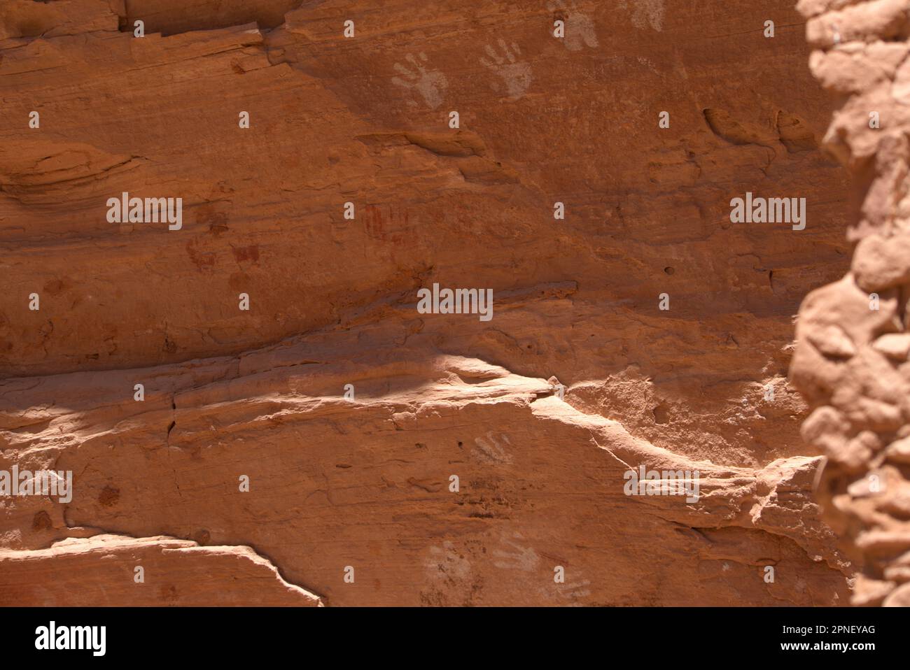 Chalk handprints of prehistoric people under an alcove in Utah's Grand Gulch Stock Photo Alamy