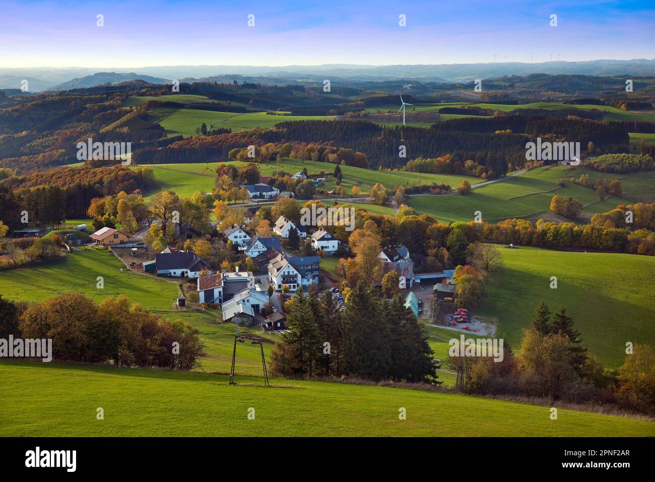 view of the landscape with the small village of Wildewiese, Germany, North Rhine-Westphalia, Sauerland, Sundern Stock Photo