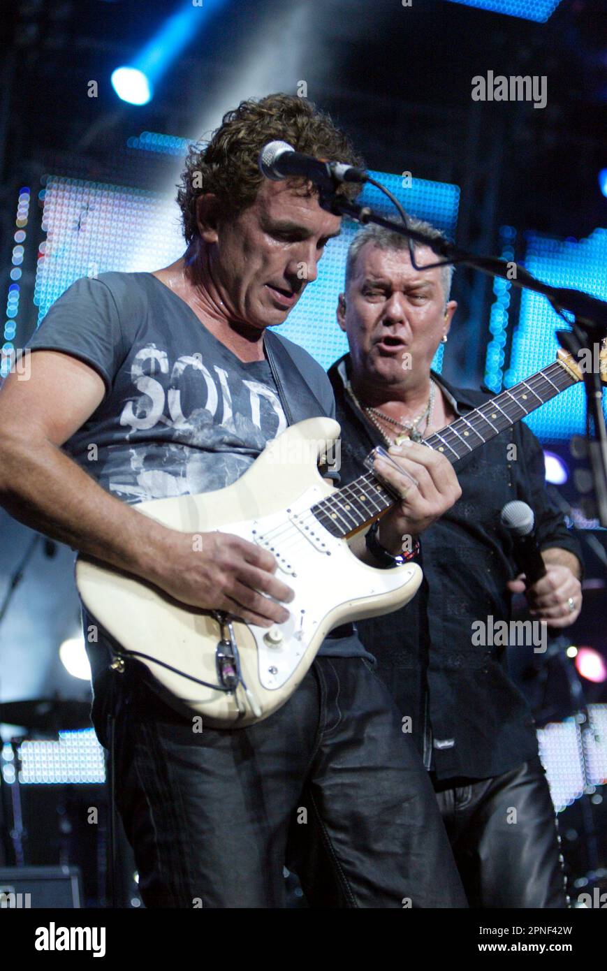 Ian Moss (left) and Jimmy Barnes Cold Chisel performing live in concert