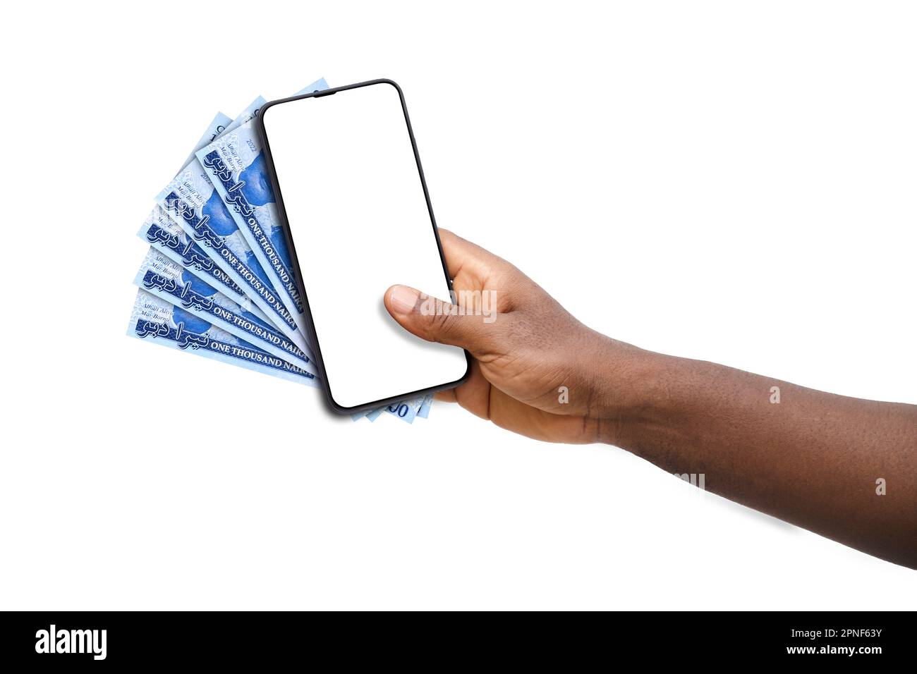 Black hand holding mobile phone with blank screen and Nigerian naira notes Stock Photo