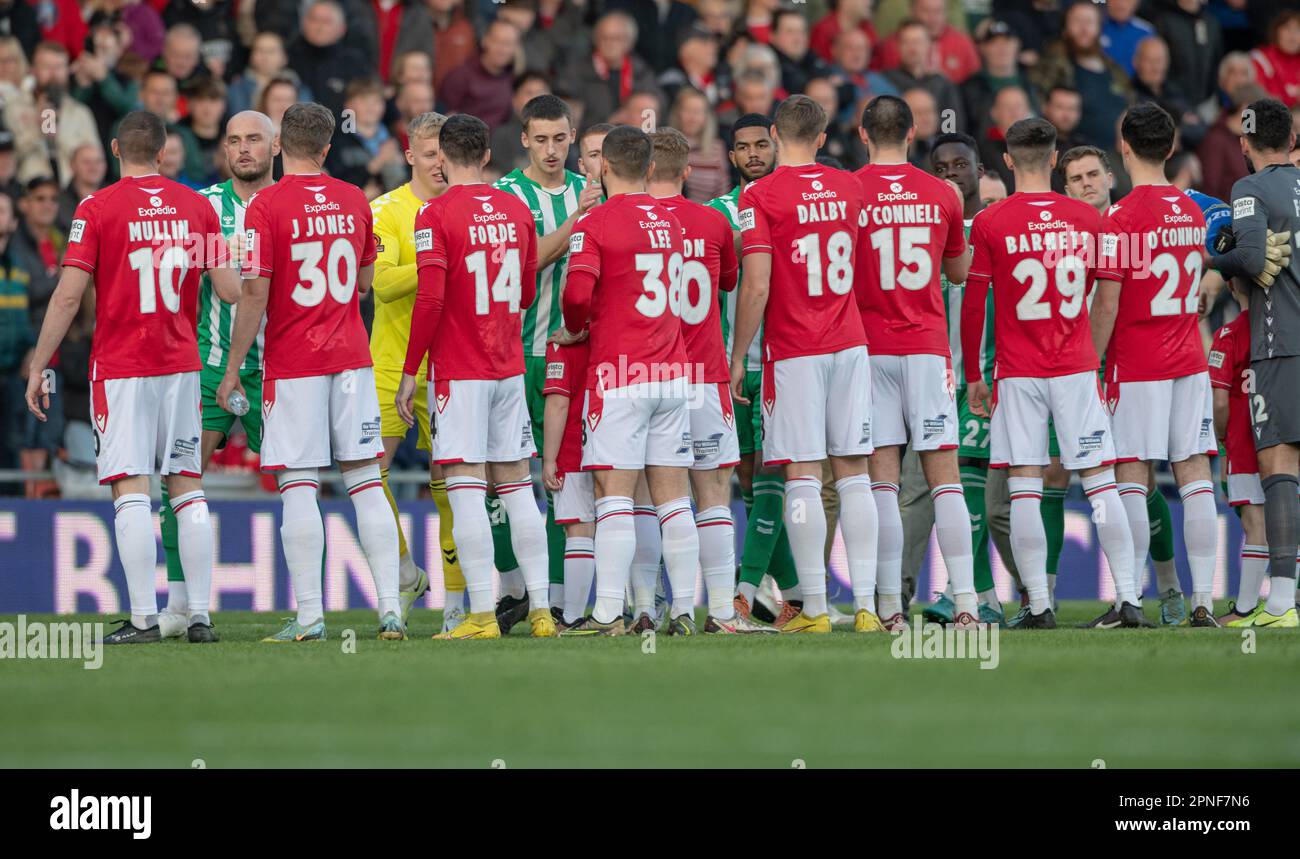 Wrexham, Wrexham County Borough, Wales, 18th April 2023. Wrexham and Yeovil teams shake hands