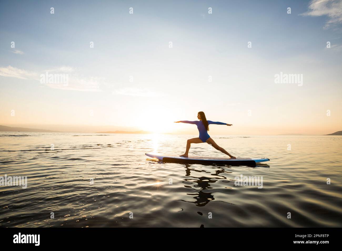 Yoga on lake woman hi-res stock photography and images - Alamy