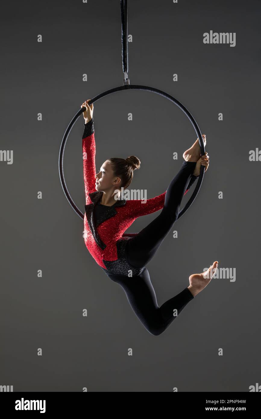 Teenage girl (14-15) performing aerial dance Stock Photo