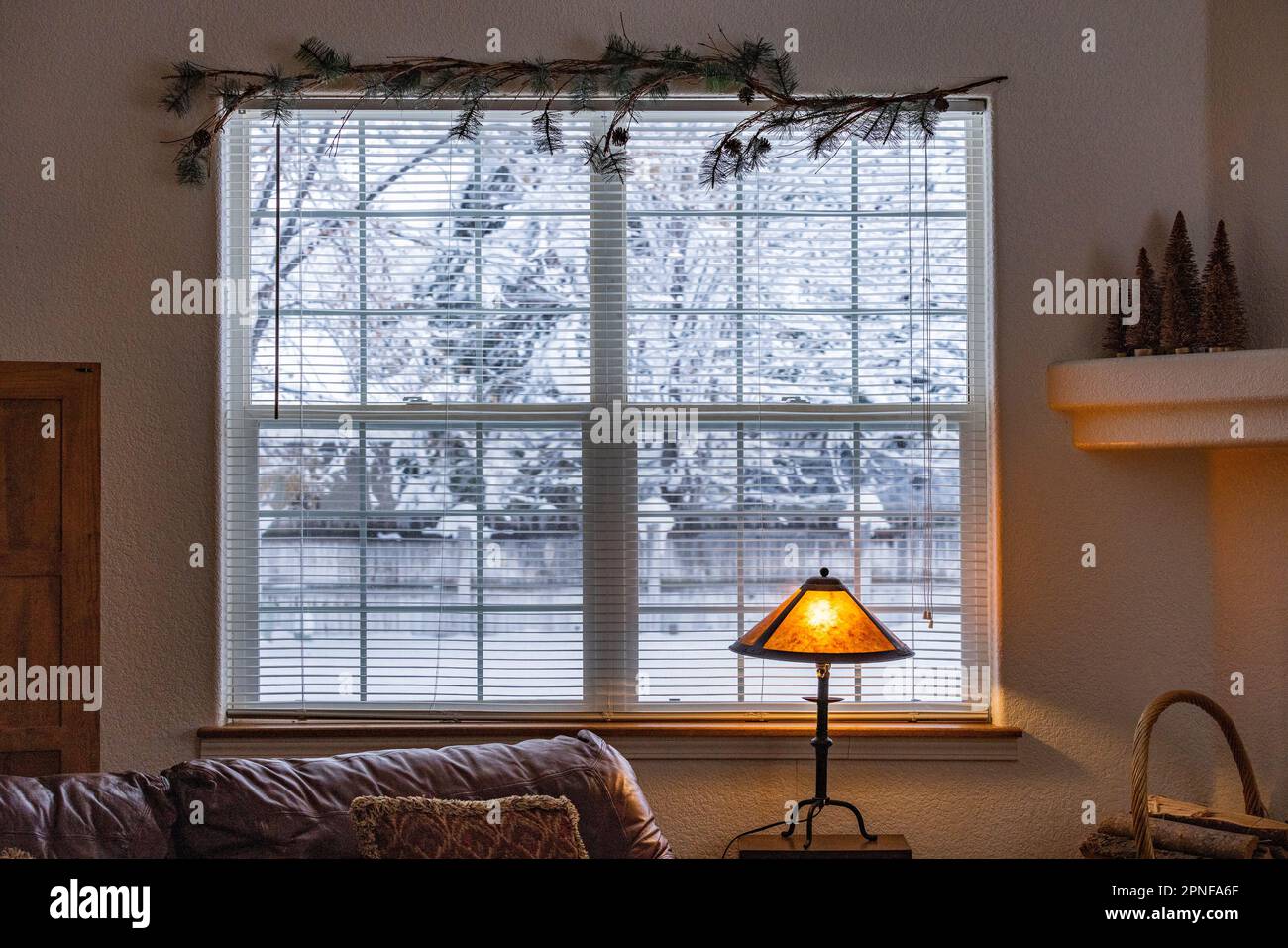 View from living room to snowy outdoors Stock Photo