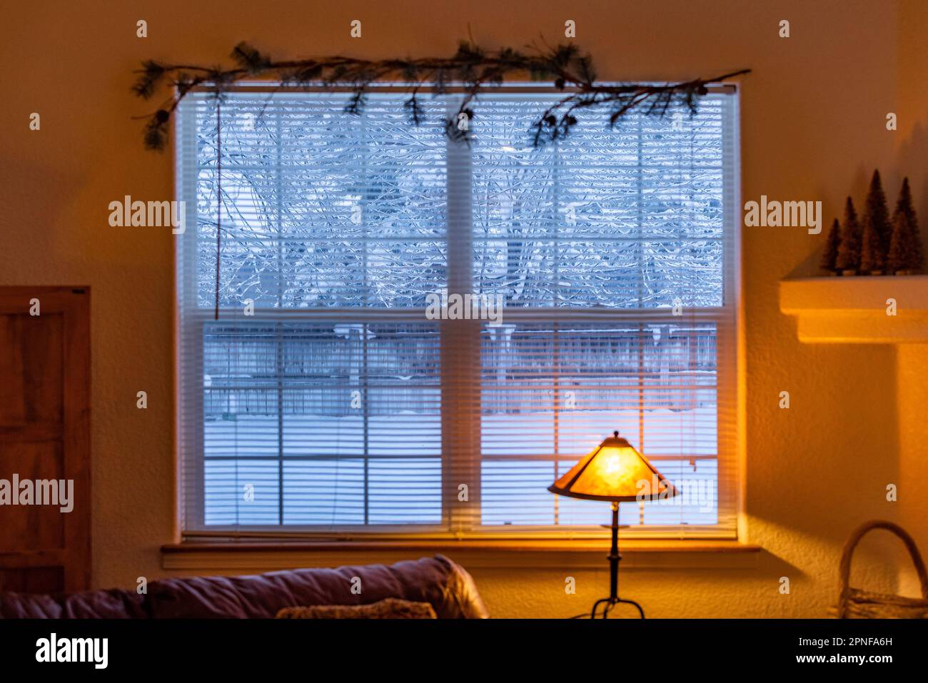 View from living room to snowy outdoors Stock Photo