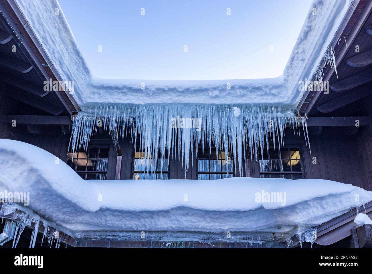 United States, Idaho, Sun Valley, Snow and icicles on roofline Stock