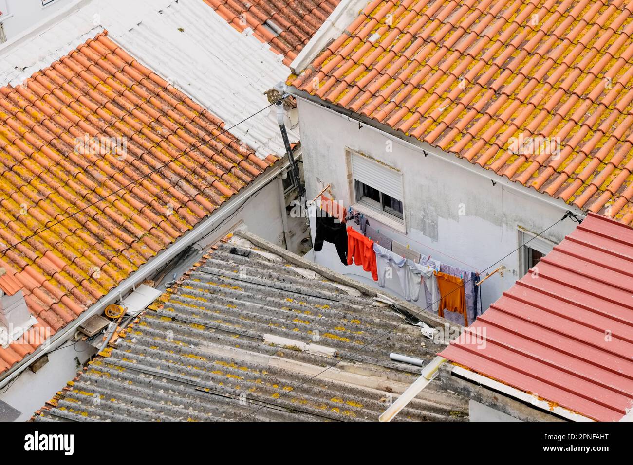 Portugal, Lisbon, Tile rooftops and hanging laundry Stock Photo