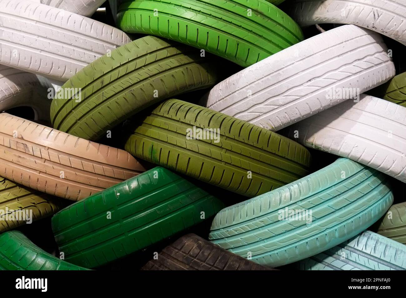 Wall of colorful recycled tires Stock Photo