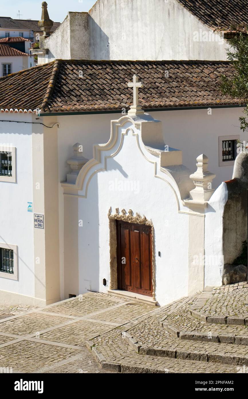 Portugal, Torres Novas, Gate to old white church Stock Photo