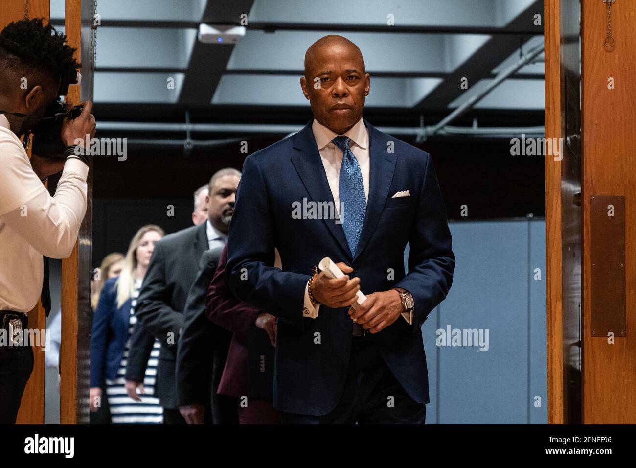 Mayor Eric Adams arrives for briefing on arrest of suspects in