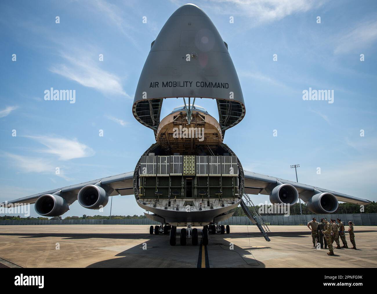 The nose of the C-5M Super Galaxy reaches its apex April 5 at Eglin Air Force Base, Fla. The 436th Airlift Wing aircraft flew to Eglin for some heavy cargo training for Air Force and Army aerial porters and loadmasters.  More than 150,000 pounds of equipment was loaded, secured and offloaded in only a few hours.  (U.S. Air Force photo/Samuel King Jr.) Stock Photo